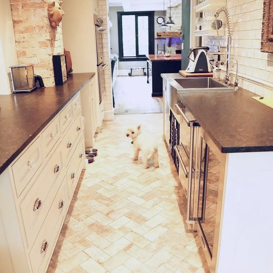 Inset kitchen with pantry cabinetry by Heirlooms Custom Cabinetry