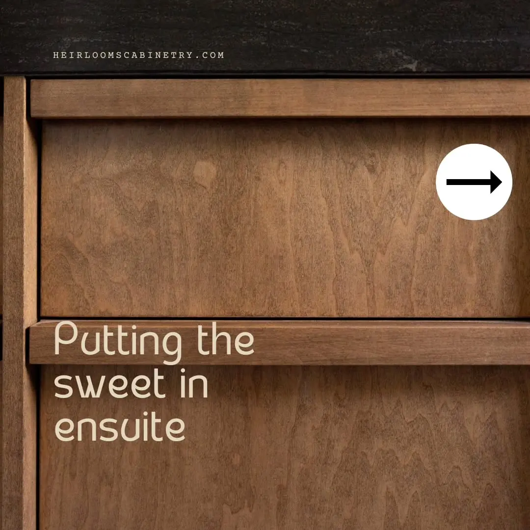 Maple vanity with pulls and drawer cabinetry by Heirlooms Custom Cabinetry