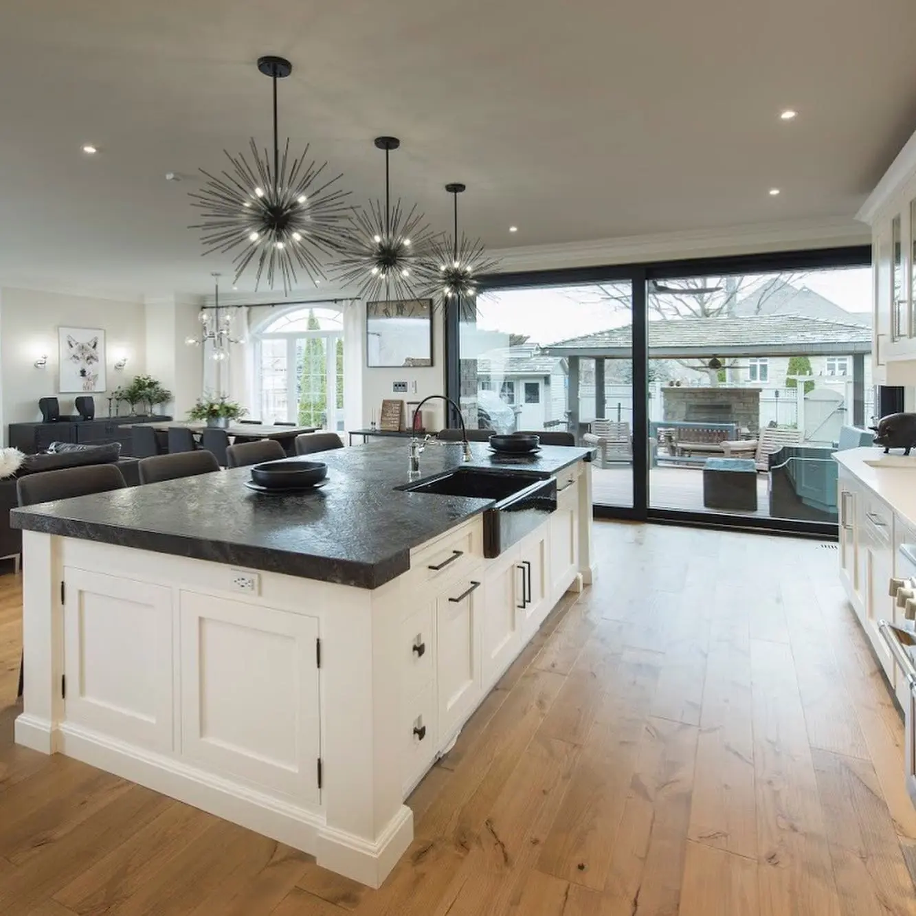Inset kitchen with island cabinetry by Heirlooms Custom Cabinetry
