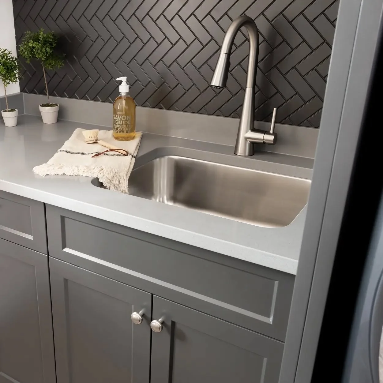 Moody Laundry Room with Herringbone - Image 1