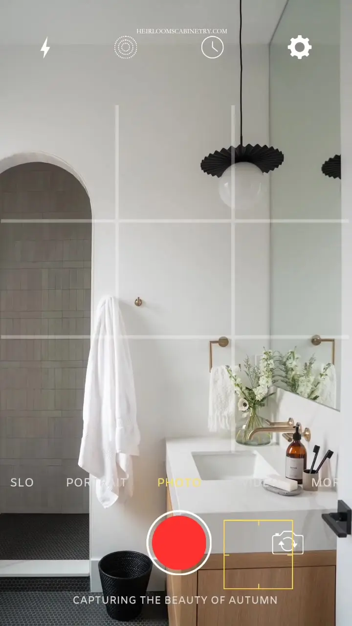 Slab white oak vanity with vanity video by Heirlooms Custom Cabinetry